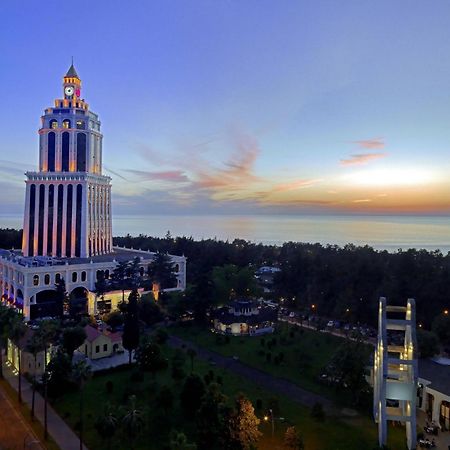 Sheraton Batumi Hotel Exterior photo The tower at sunset