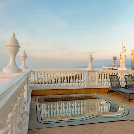 Sheraton Batumi Hotel Exterior photo The rooftop pool at the Taj Mahal Palace