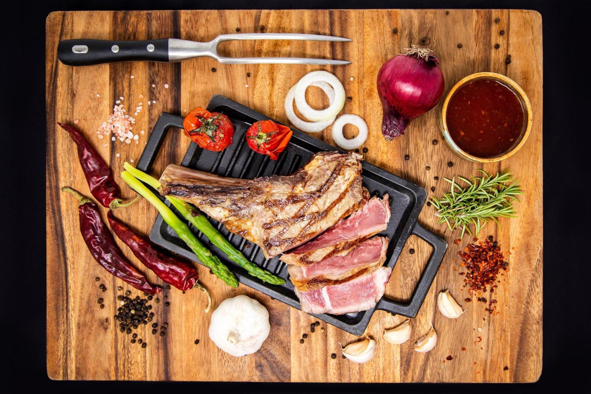Sheraton Batumi Hotel Exterior photo A steak on a cutting board