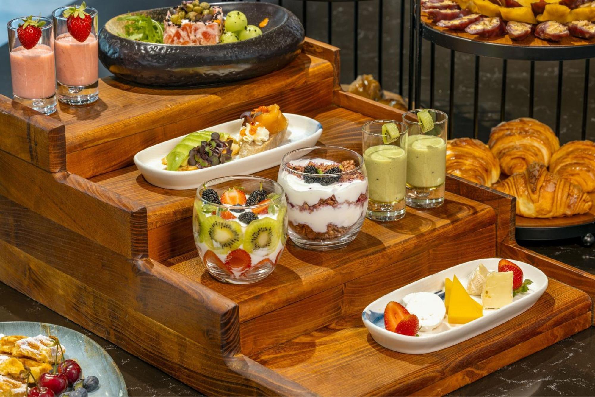 Sheraton Batumi Hotel Exterior photo A selection of desserts